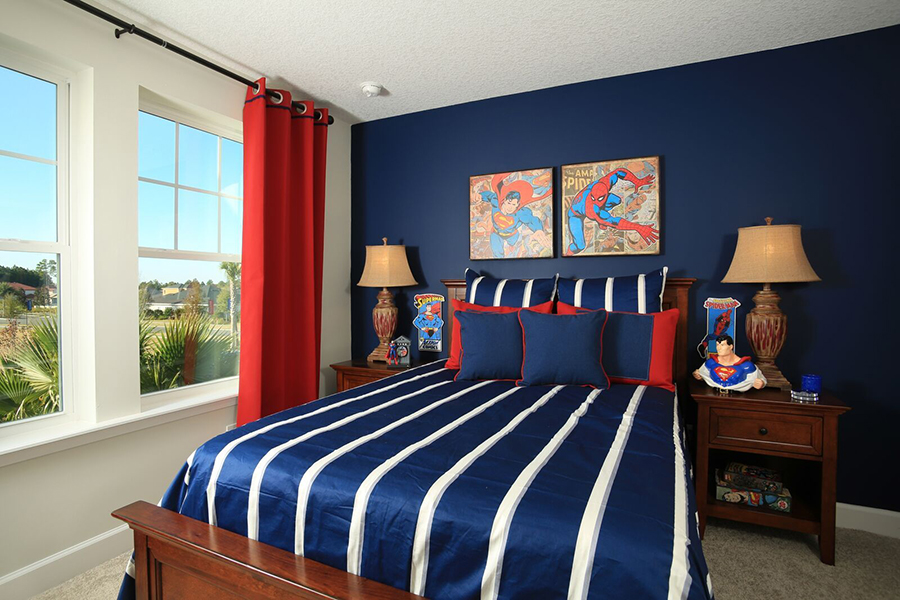 Phong cách thiết kế phòng ngủ cho bé trai với tông xanh huyền thoại gắn liền siêu anh hùng Superman vô cùng ấn tượng và nổi bật